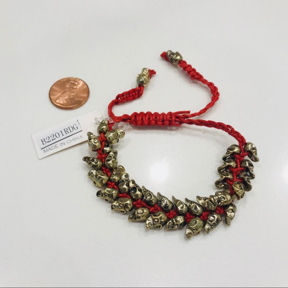 NWT bracelet, multiple bronze skulls & red thread - Picture 2 of 8